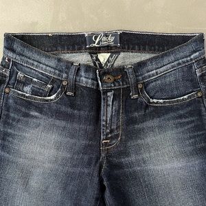 Lucky brand jeans. Between bootcut-flare leg.
